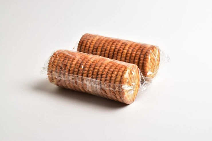 Two rolls of biscuits enclosed in transparent film