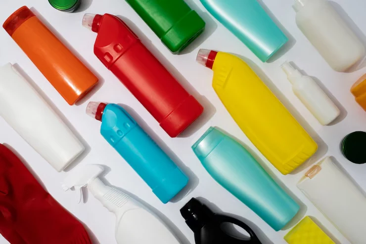 An overhead arrangement of colourful household-product bottles