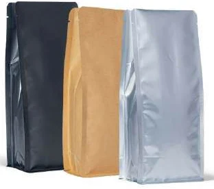 Black kraft and silver flat-bottom pouches