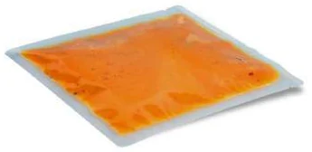 Transparent flat retort pouch containing orange sauce