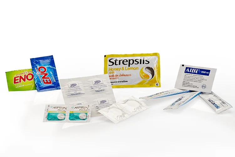 Assorted printed healthcare sachets and individually wrapped packs