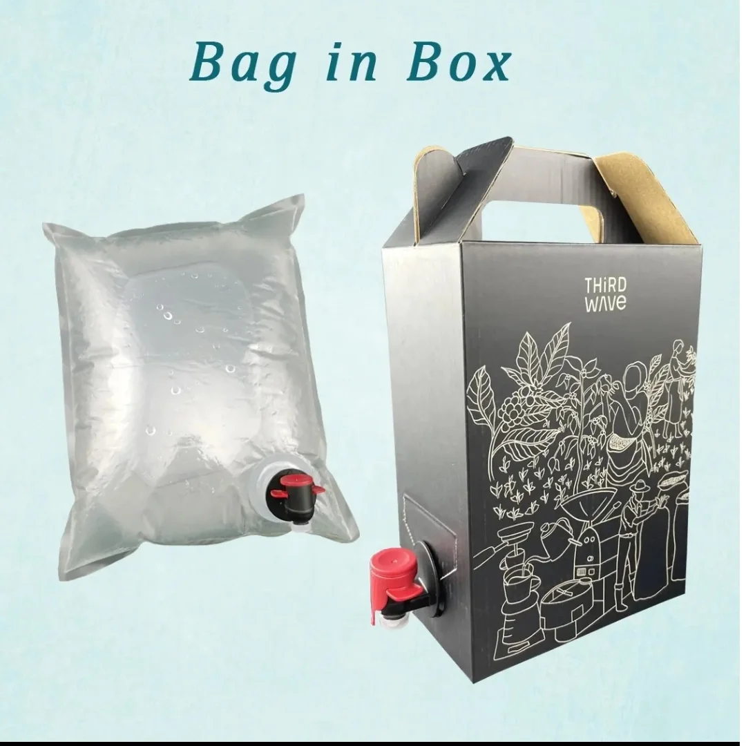 Silver liquid liner and a printed bag-in-box outer carton with a dispensing tap