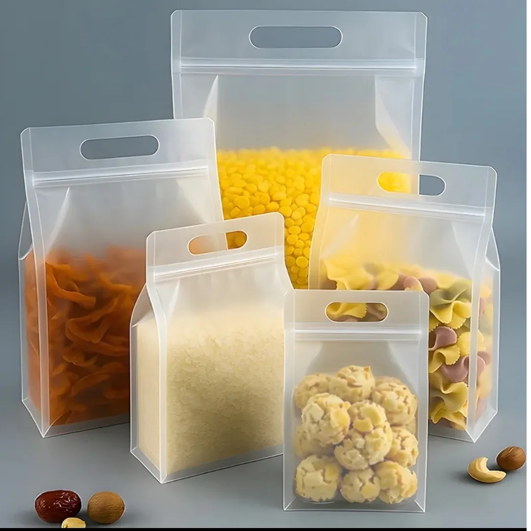 Clear gusseted handled pouches containing pasta grains and nuts