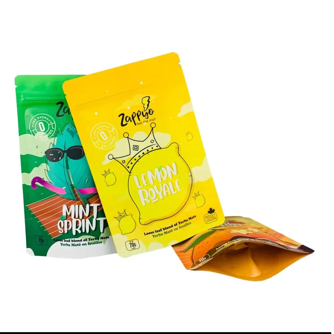 Green and yellow printed pouches with mint and lemon artwork