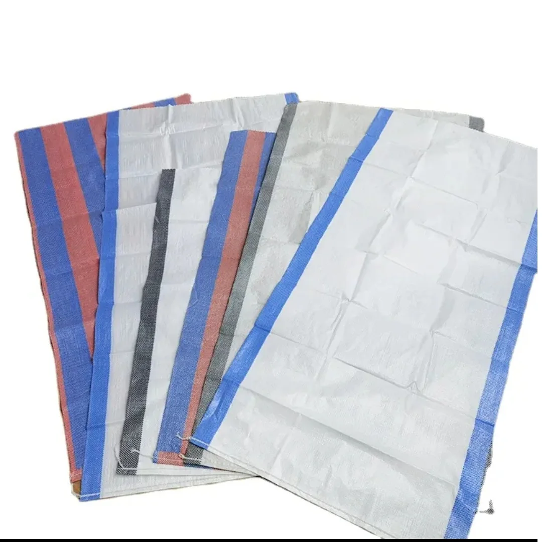 White woven sacks with coloured edge stripes arranged together